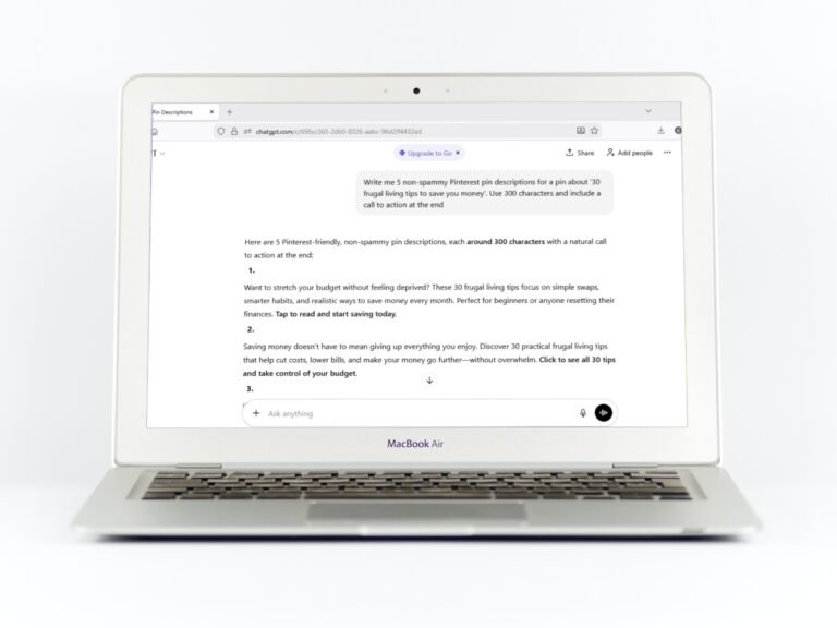 A laptop screen showing an AI chatbot generating Pinterest pin descriptions for a blog post about frugal living tips.